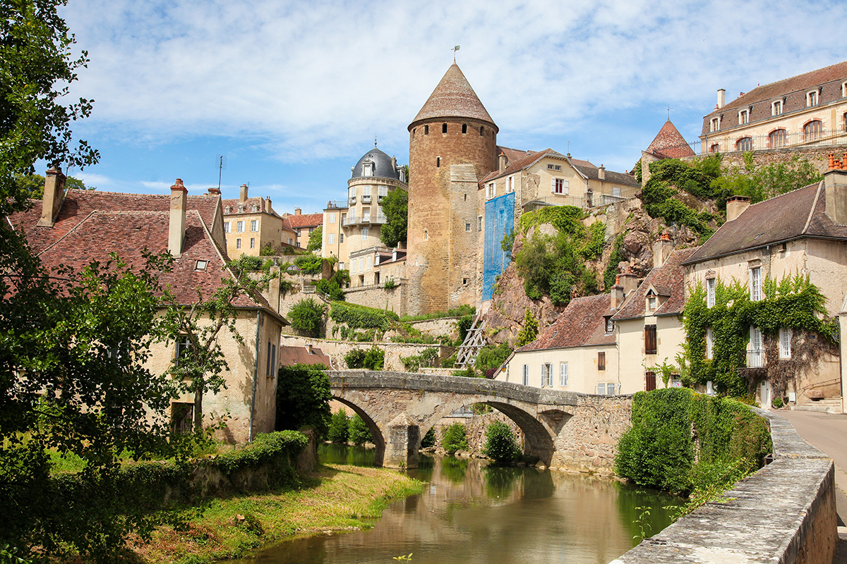Old town in France with whimsical castle like buildings turrets cottages