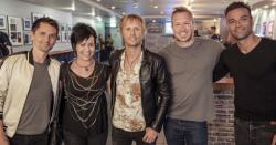 Who won the Muse tickets charity auction?